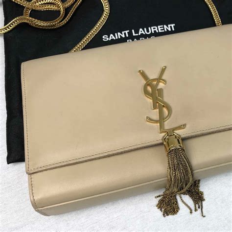 ysl reversible purse|YSL medium tassel bag.